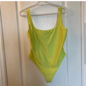 Meshki neon yellow bodysuit size S Small